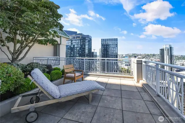 The Rooftop terrace of the Cosmopolitan in Seattle, offering an impressive vantage point of the city and waterfront.
