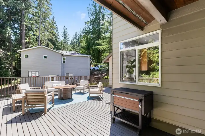 Step out onto a large private deck with lots of sun!