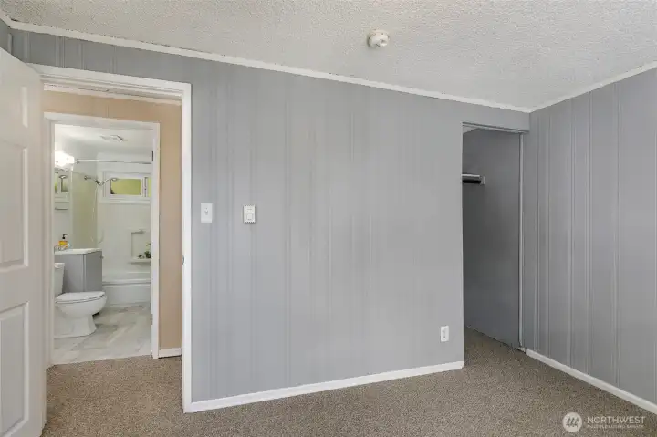 2nd view of front bedroom to updated bath