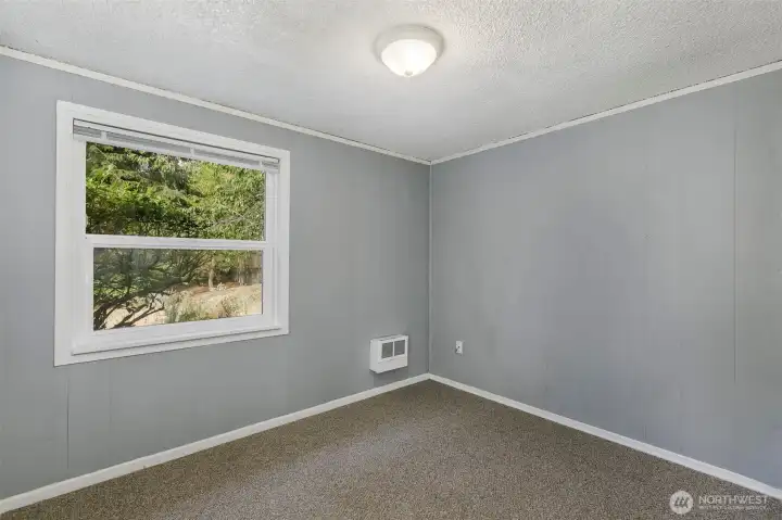 Rear bedroom enjoys backyard views