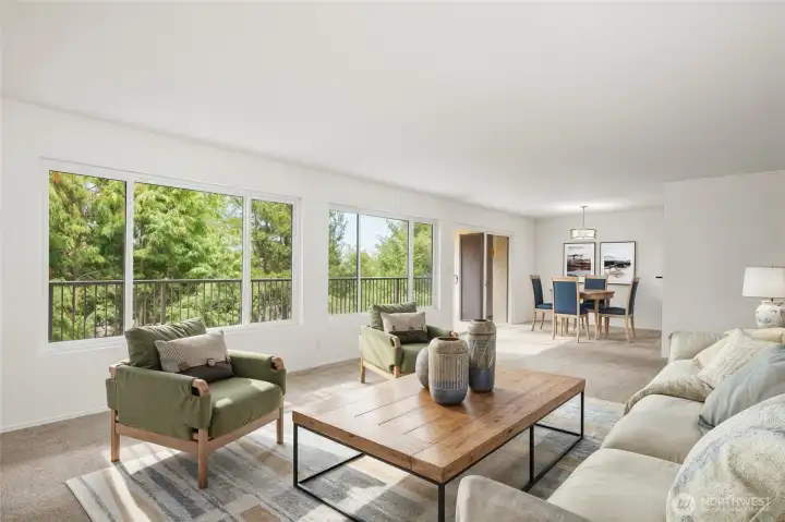 Open floor plan living/dining *virtually staged*