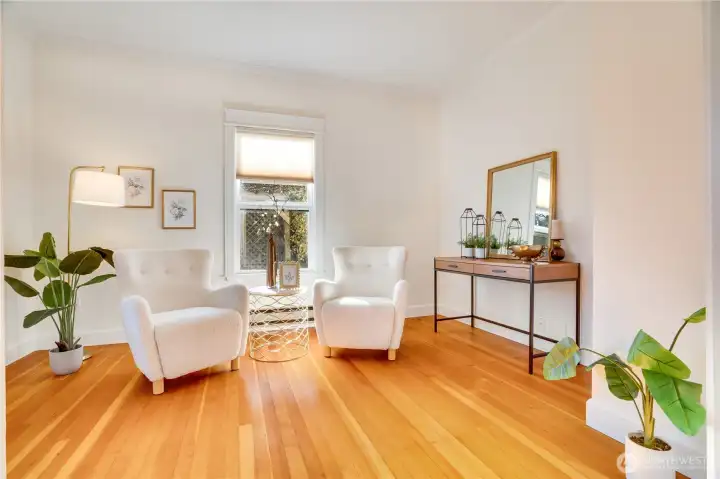 Den/office, located to the left of the door upon entering the home.