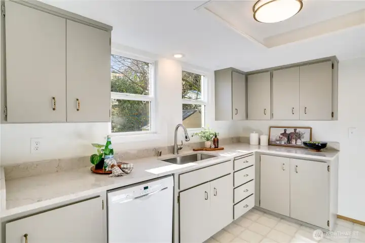 Refreshed kitchen: New Countertops, single basin sink. Fresh paint throughout the home.