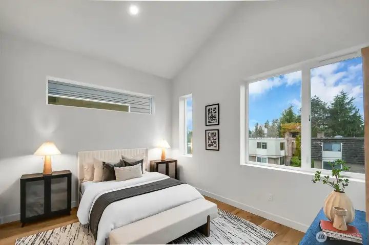 The Primary Bedroom features a vaulted ceiling