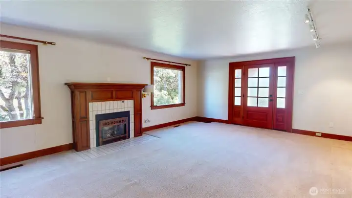 Living room looking towards front entry & fireplace