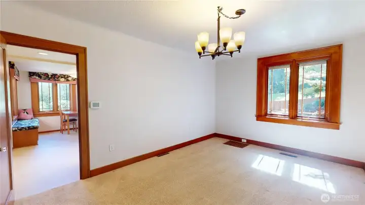 Dining room looking from arch to living room