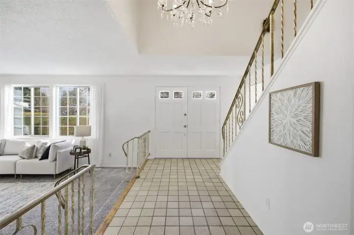 Elegant double doors introduce this classic Colonial style home, featuring timeless character and a warm, inviting feel.