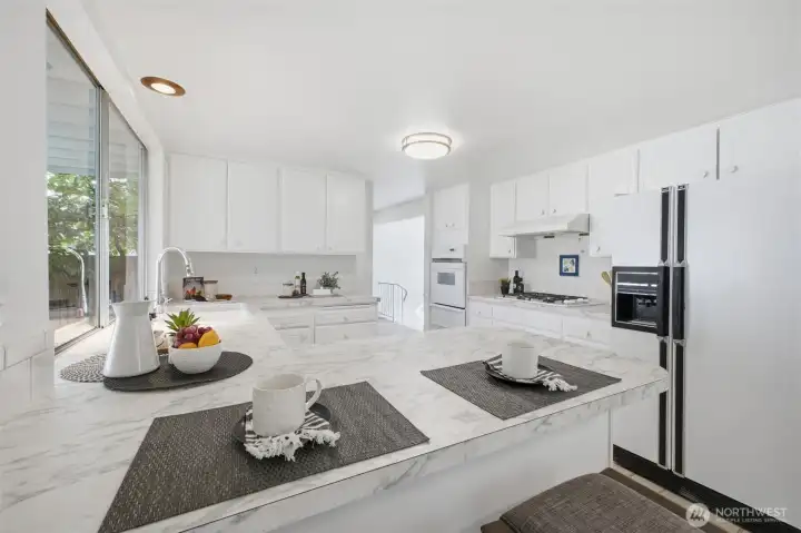 There is plenty of space for everyone in this kitchen.