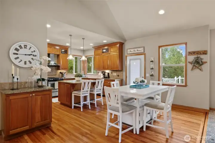 Kitchen table dining space. Back deck access. Door with internal blind. Lot's of natural light. Hardwood floor inlay is beautiful and memorable.