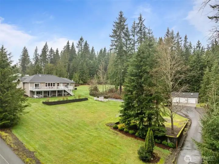 Driveway to three car shop with power.