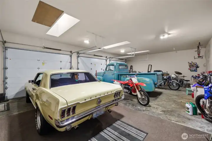 Attic access, skylights, room to restore and renew.