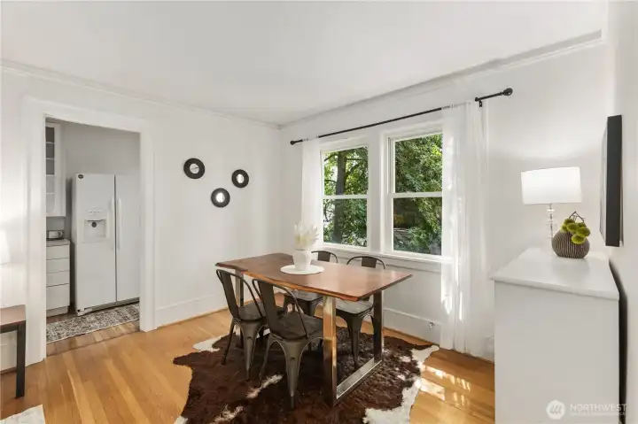 Dedicated dining area with window air conditioning unit that can be stored when not in use