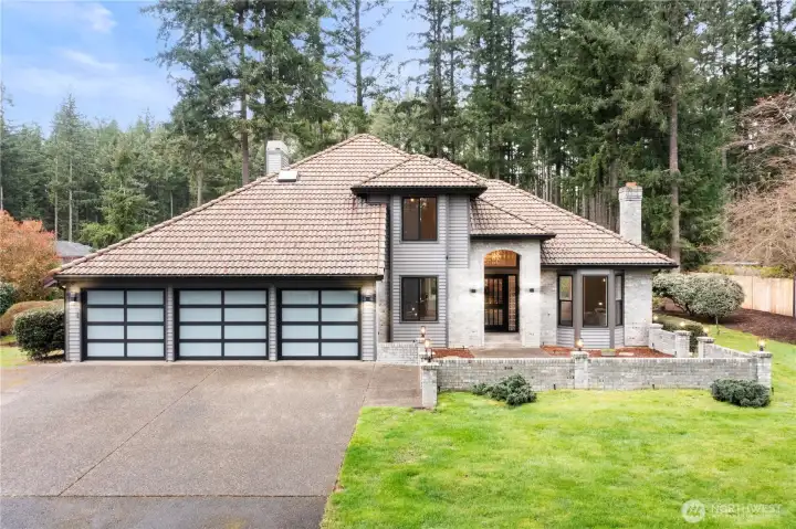 Completely remodeled home near Lake Sawyer on shy 3/4-acre lot that is level, fully fenced with gated entry.