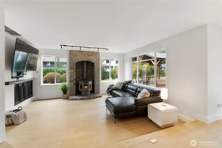 Family room with built-in entertainment center, pellet stove and overlooks the spacious deck and backyard.