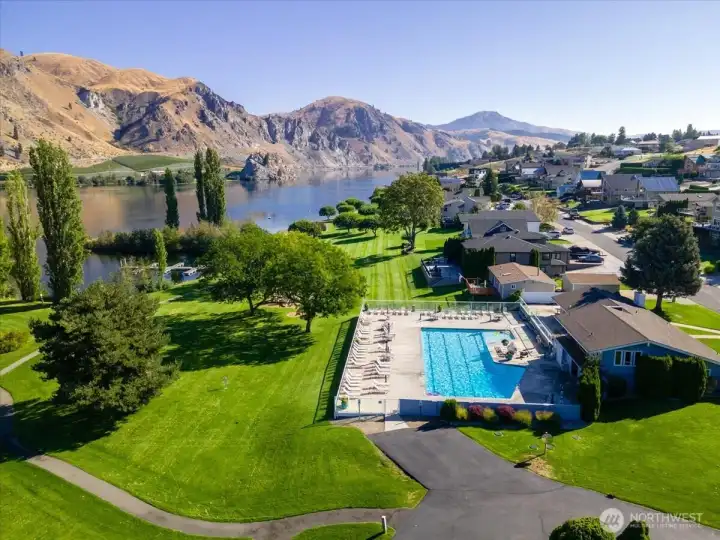 Aerial view 3 of Sun Cove community waterfront with clubhouse, pool, boat launch, marina, parks and playgrounds.