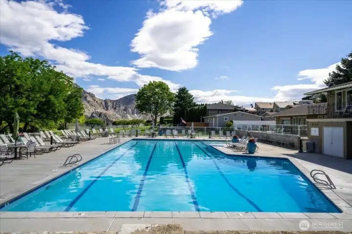 View of Sun Cove community pool and lounge area.