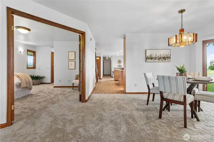 The primary suite features French doors off the Main Living area