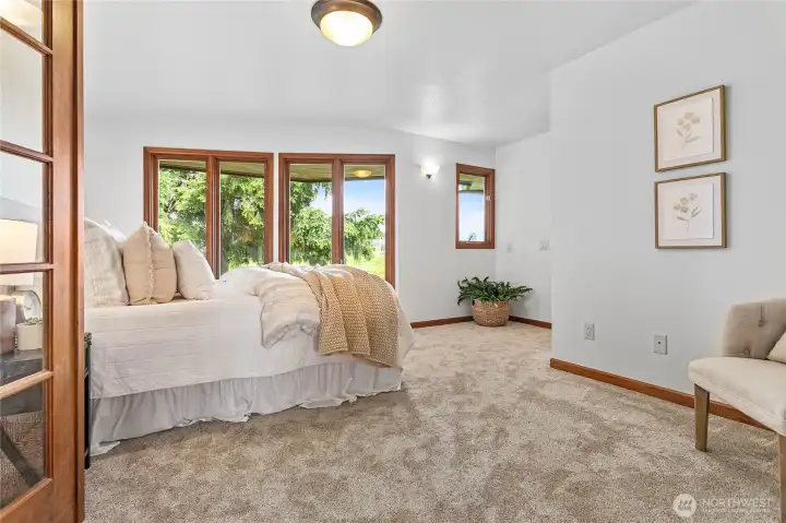 Primary Bedroom looks east to the mountains