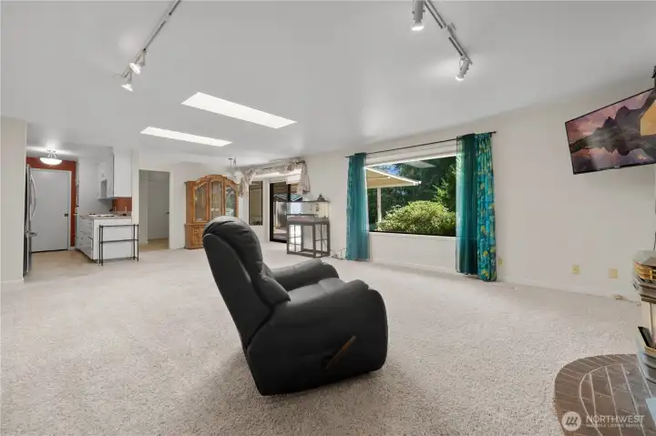 Living room with skylights for added natural light Living room with skylights for added natural light