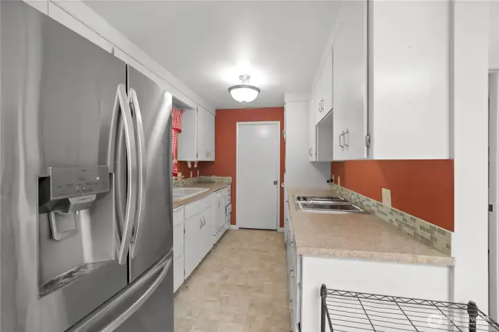 Kitchen with stainless steel fridge Kitchen with stainless steel fridge
