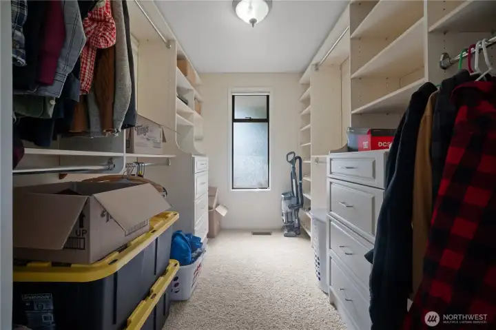13. Custom Walk In Closet off Primary Bedroom 13. Custom Walk In Closet off Primary Bedroom