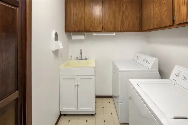 Laundry room with Utility sink and storage Laundry room with Utility sink and storage