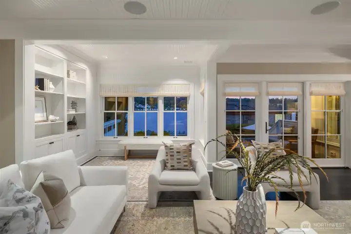 The living room is light and bright as the sun sets behind this home. The living room is light and bright as the sun sets behind this home.