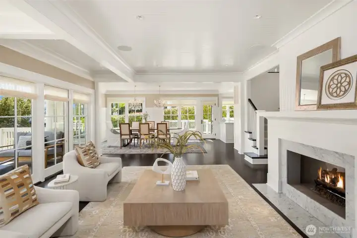 French doors lead to a covered heated patio and stairs to the lower patio and pool deck. French doors lead to a covered heated patio and stairs to the lower patio and pool deck.