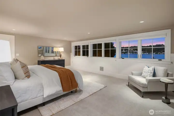 Stunning primary suite with sweeping view of the Lake. Gorgeous sunrises. Imagine waking up to this every day! Stunning primary suite with sweeping view of the Lake. Gorgeous sunrises. Imagine waking up to this every day!