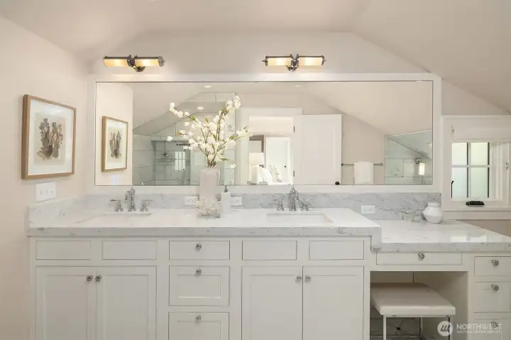 Ensuite luxury bathroom complete with two sinks and a vanity Ensuite luxury bathroom complete with two sinks and a vanity