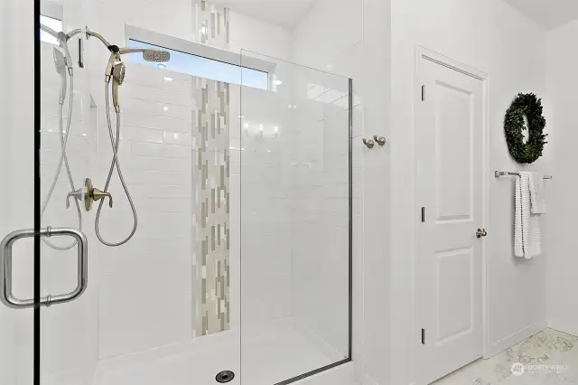 The walk-in, tiled shower is beautiful as well as functional.