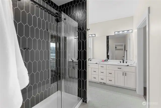 Beautifully tiled walk in shower.