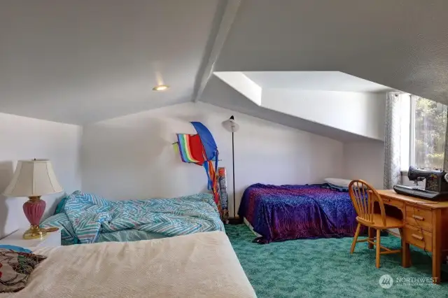 Sleeping loft with views of the dunes to the west