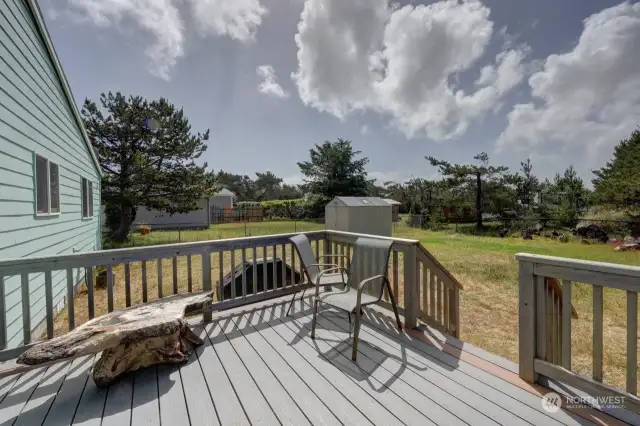 Back deck with access to fully fenced yard