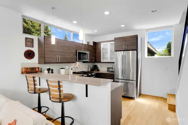 Beautiful newer kitchen with tons of natural light coming through the south facing windows!