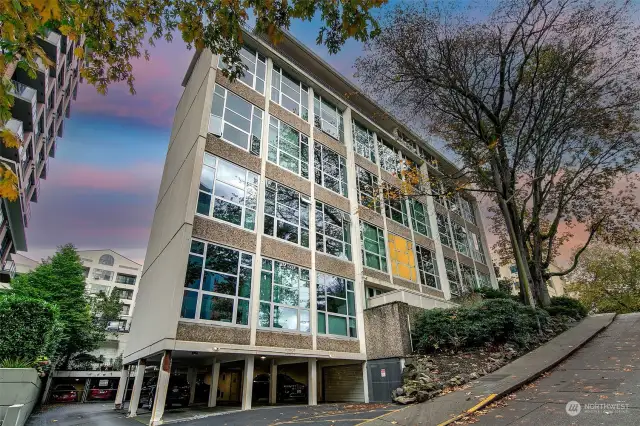 This 65-unit, classic mid-century building blends concrete and steel construction with modern conveniences. Enter with electronic fob and enjoy access to an elevator, gym, sauna, storage, and laundry. Pet-friendly and rental-friendly (after one year of ownership). Affordable parking is available across the street, and reasonable monthly dues are just $475, with no outstanding HOA assessments.
