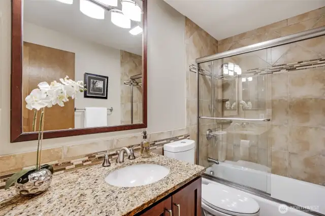 Main Bath Updates include Granite counters and tiled Bath Surround and Floors