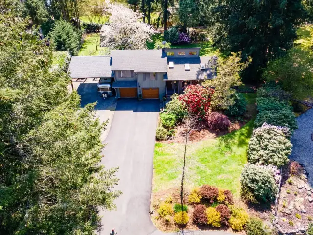 Long Drive into home on the Shy Acres Homesite offers room for Covered boat or RV Parking.