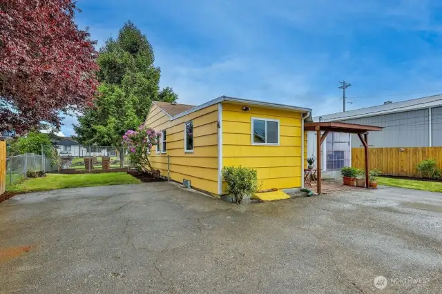 Main House and Detached garage with separate utility meter. Large lot with ample parking