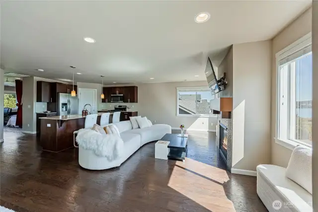 Bright with lots of natural light. Put up your feet in one of a number of cozy nooks and take in the water view!