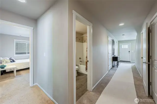 Entry level with 3 sizable bedrooms and a full bathroom. Entry level is not a basement. Light-filled and excellent ceiling height. A soft or hard partition can divide entry level and upper level so 2 units, ADU, MIL, Airbnb, short term rental or long term rental etc. Many possibilities.