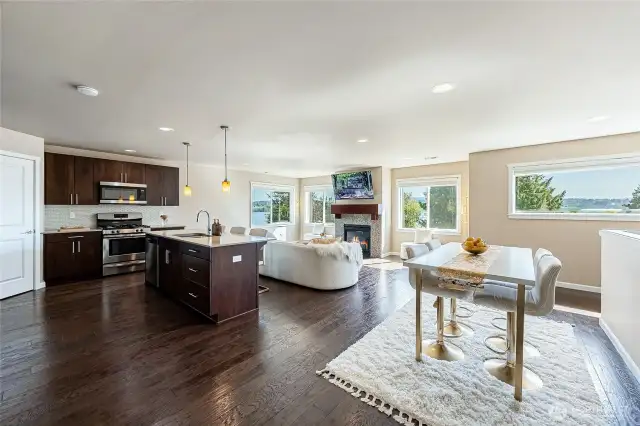 Take in all the picture windows with lake and mountain views! Open concept living/kitchen/dining. Must see!