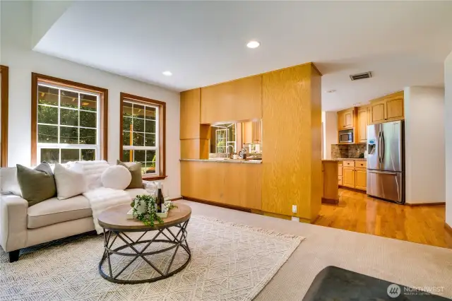 Cozy living room off the kitchen with a warm wood fireplace