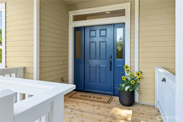 A covered front porch welcomes you home and greets your guests.