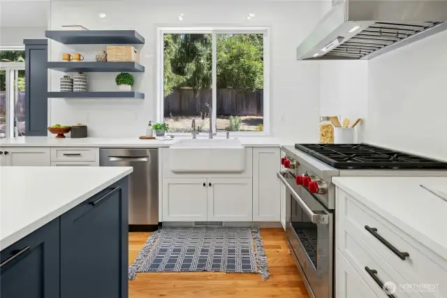 This fabulously remodeled kitchen is the heart of the home and this one has wonderful connection to a breakfast nook, the family room and the back yard.