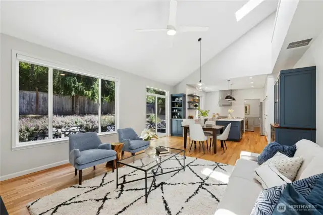 From the family room looking into the kitchen. Terrific light from multiple windows and a skylight fills this space.