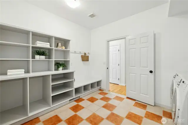 Another look at this terrific laundry room. This room connects to the large 3-car garage, which has even more storage space.