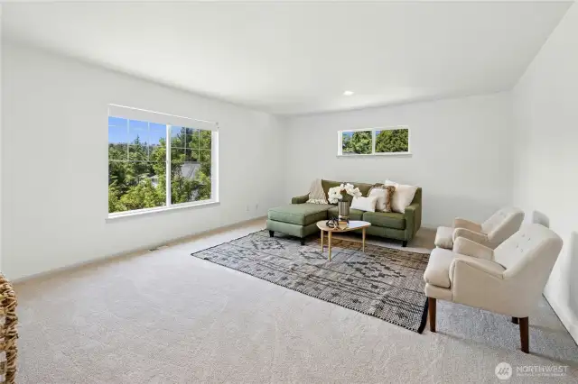 The roomy fourth bedroom (or bonus room) upstairs has plenty of room for two beds.