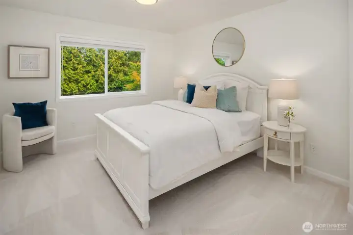 Upper level bedroom #4. All the bedroom closets feature custom closet systems for easy organization.