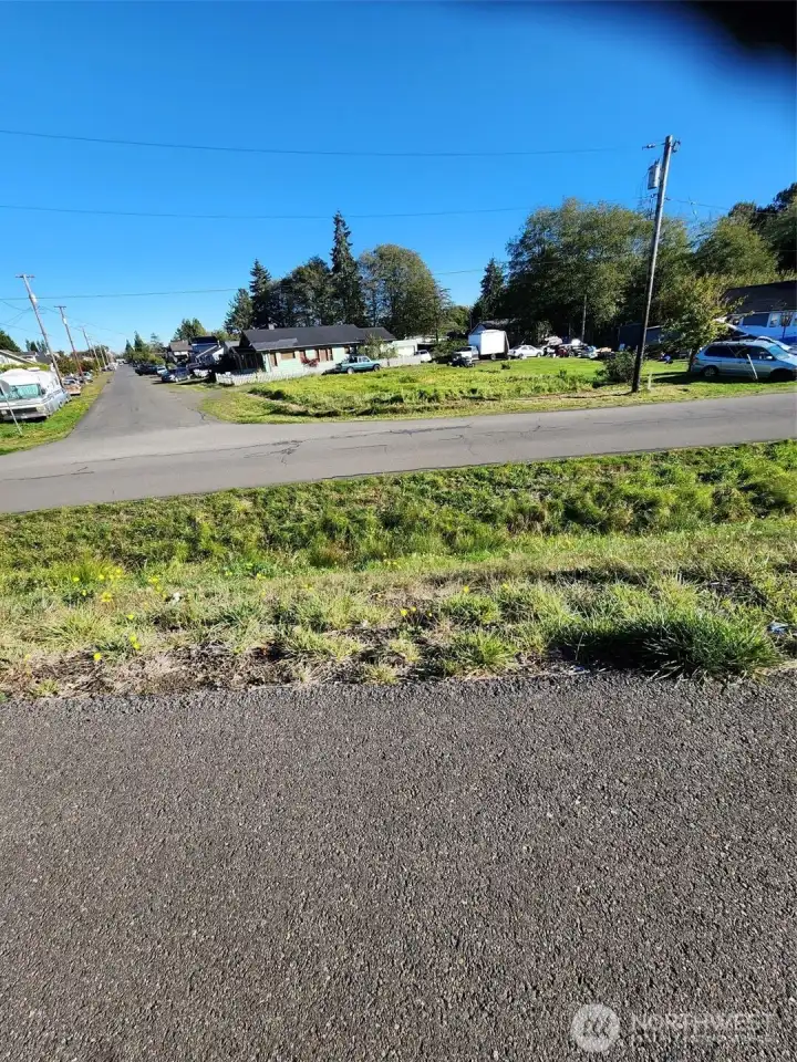From the walking trail, view of the corner lot.